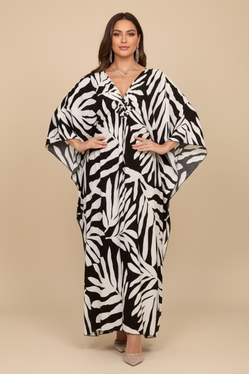 Zwart-witte kaftan met palmbladeren print - voorkant
